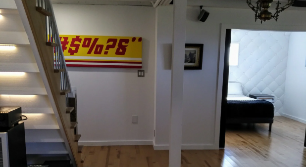 Spacious Playroom/TV room between the two downstairs bedroom