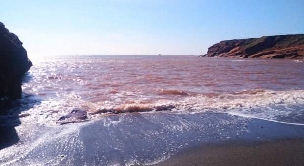 On windy days, the water in our private beach turns red with sand stirred up by the rough waves. On calm days its crystal clear and blue