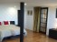 Master bedroom, very spacious with view on the sea + direct access to outside, large walk in, we call it the private suite