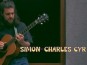 Simon-Charles Cyr performing music at the Café!