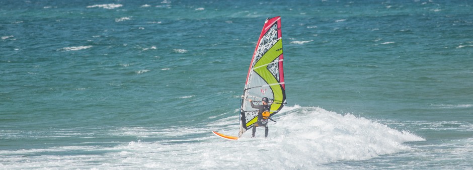 windsurfer riding on the lagoon