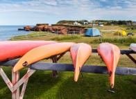 Kayaks resting on a rack, waiting for the next adventure