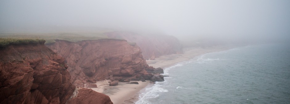 Fog embracing the red cliffs of the Magdalen Islands. The red cliffs in the mist, the Magdalen Islands in all their mystery.